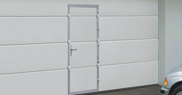 Puertas seccionales con puerta peatonal Puertas seccionales industriales